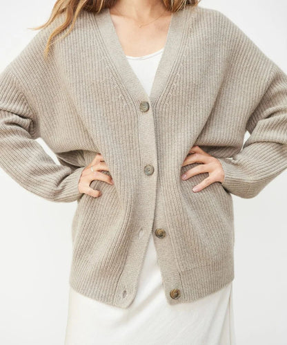Stylish women's V-neck knitwear cardigan, soft and elegant for comfortable wear.