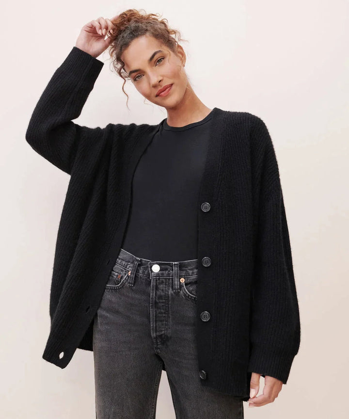 Soft women's V-neck cardigan, a comfortable and stylish knitwear piece for layering.