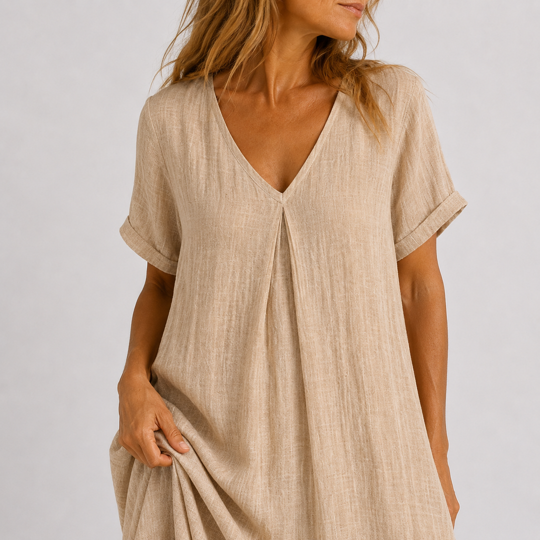 Fashionable women's V-neck maxi dress. Versatile, comfortable, and flowy, a must-have for spring & summer wear.