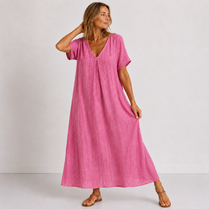 Elegant women's V-neck maxi dress with rolled sleeves. Relaxed fit, comfortable & flowy for spring & summer fashion.