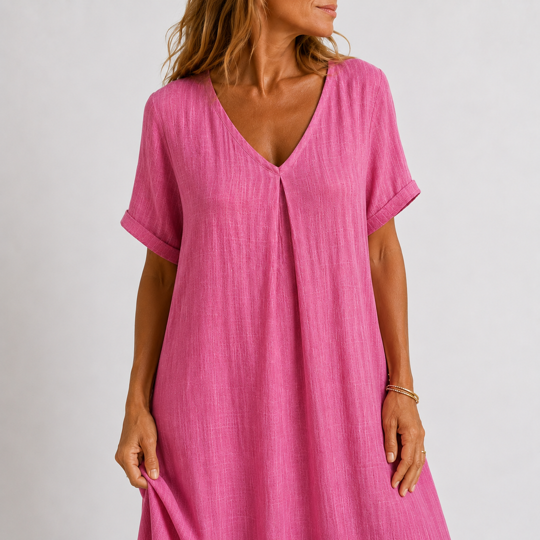 Casual flowy V-neck maxi dress for women. Stylish rolled sleeves for a comfortable, relaxed, everyday summer look.