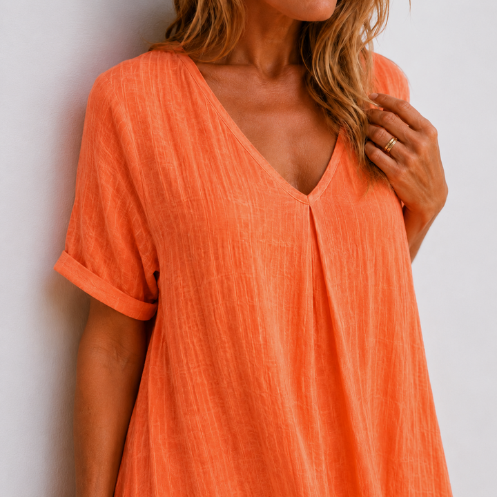 Women's comfortable V-neck maxi dress. Relaxed fit, flowy design, perfect for modern spring and summer fashion.