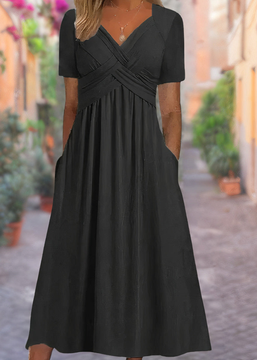 Women's V-neck flowy summer dress, tummy-covering, comfortable and versatile for casual elegance.