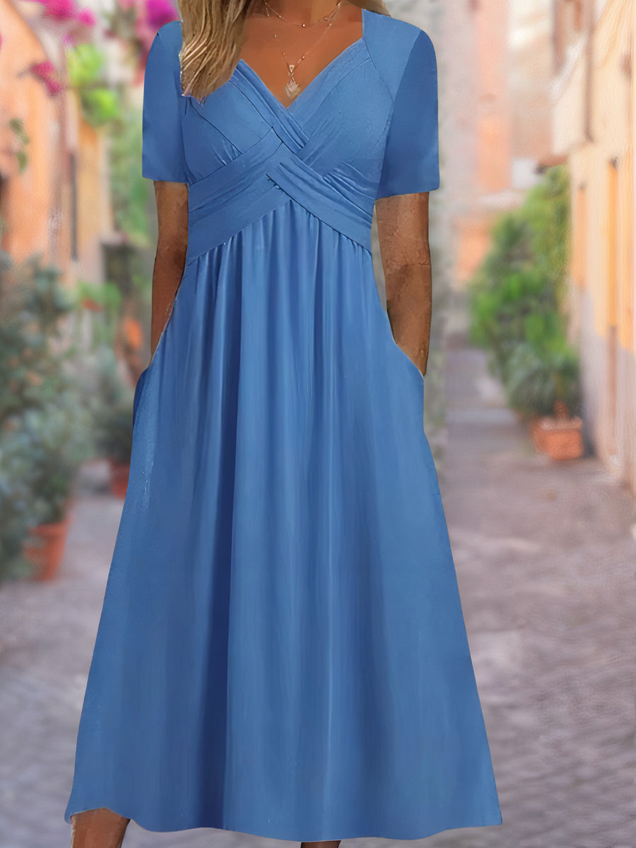 Elegant sleeveless midi dress for women with a V-neck, perfect for summer, beach, or casual wear.