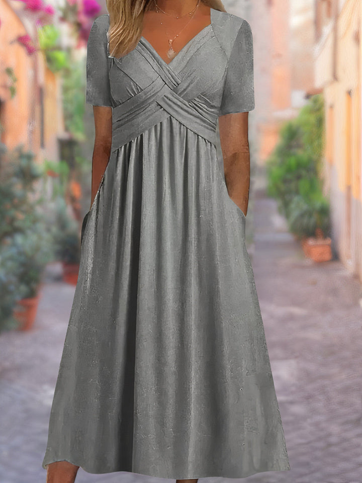Versatile V-neck sleeveless dress for women, offering a relaxed flowy fit perfect for any summer day.