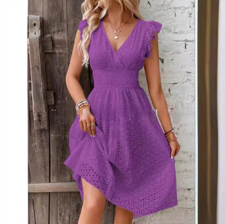 Flowy women's summer V-neck dress featuring delicate flutter sleeves, an elegant beach or casual choice.