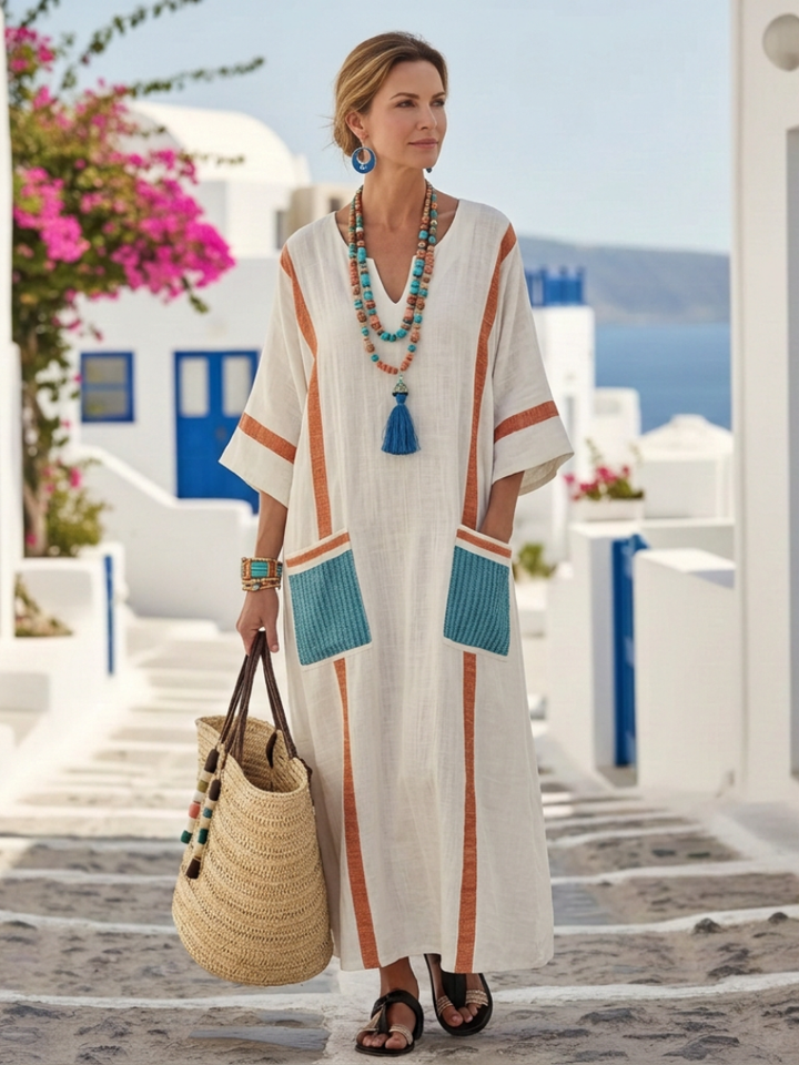 Casual women's long V-neck maxi dress with half sleeves & functional pockets. Great for summer outings.