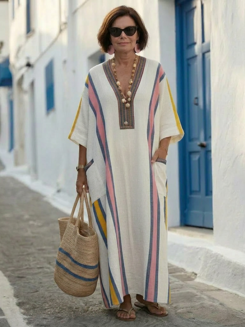 Everyday women's V-neck half sleeve long maxi dress with convenient pockets for casual wear.