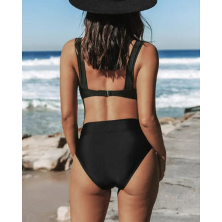 Vibrant women's high-waisted two-piece swimsuit; flattering V-neck swimwear for summer.