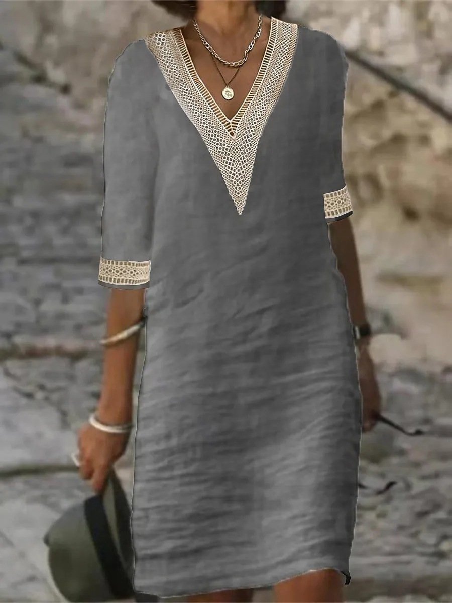 Relaxed fit ladies midi dress, V-neck, lace trim and 3/4 sleeves for chic everyday fashion.