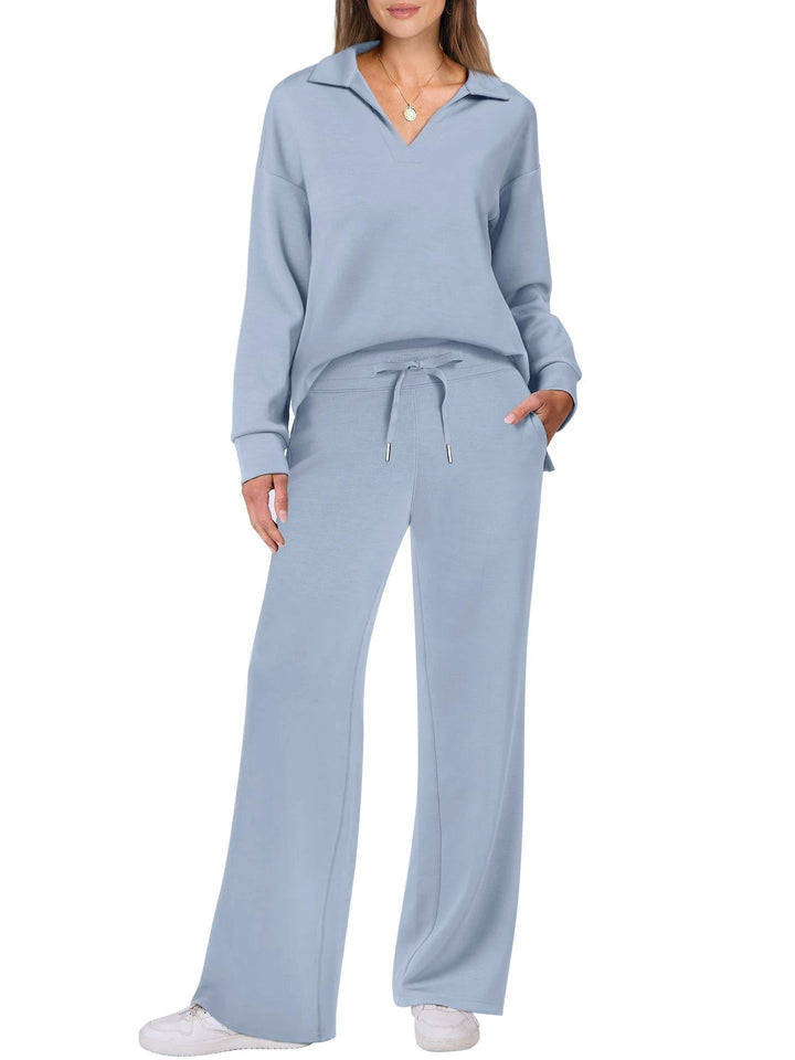 Fashionable women's two-piece V-neck long sleeve top and wide leg pants loungewear for comfort.