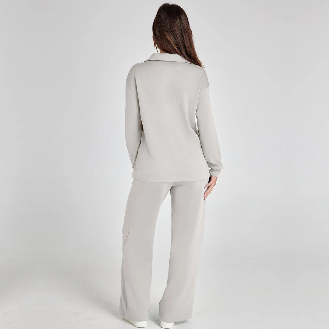 Soft women's two-piece V-neck loungewear set with long sleeves and elegant wide leg pants.