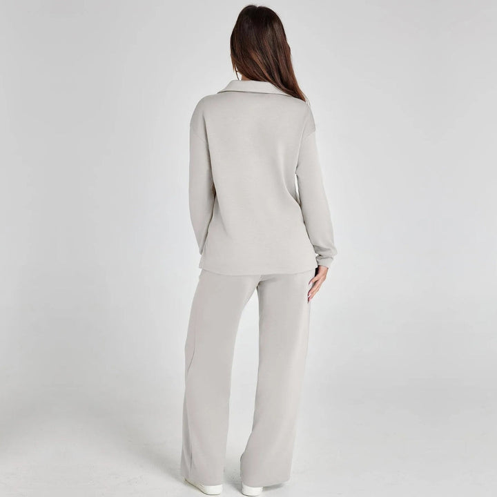 Soft women's two-piece V-neck loungewear set with long sleeves and elegant wide leg pants.