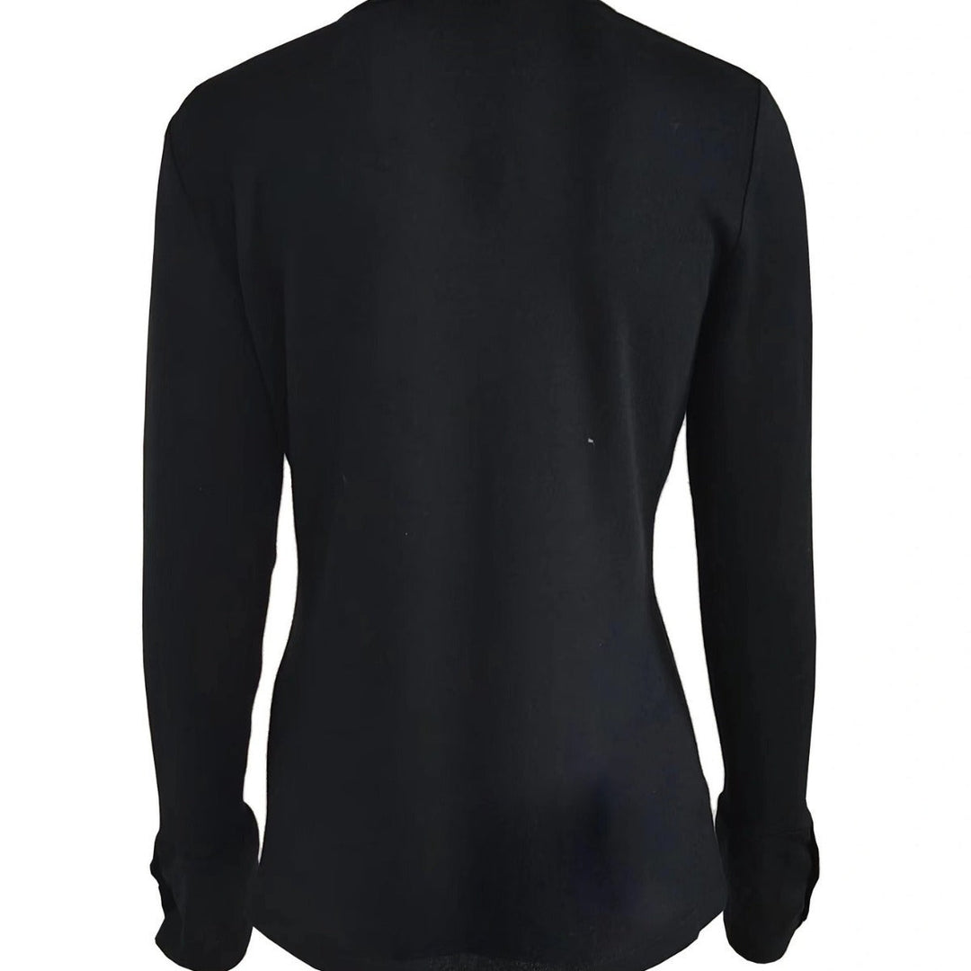 Slim fit women's V-neck long sleeve top, highlighting the elegant button detail. A stylish and comfortable casual top.