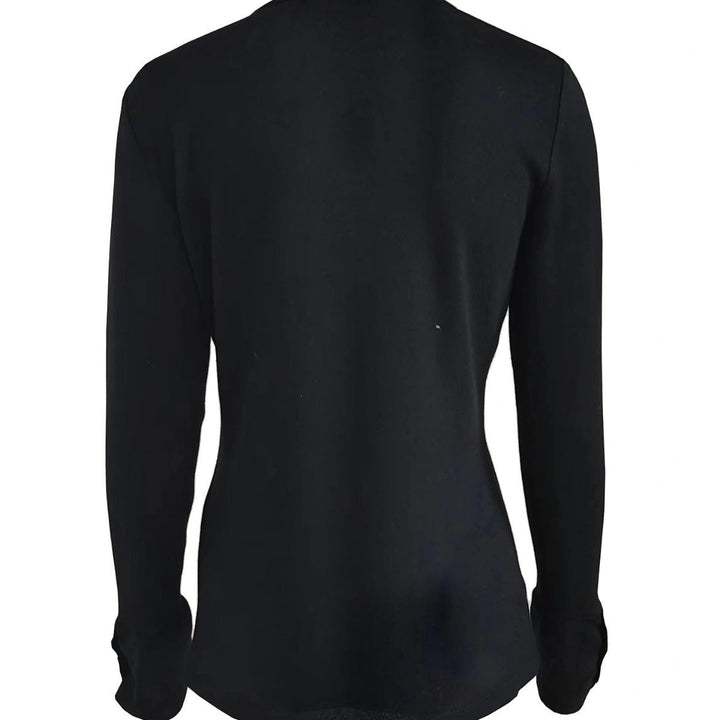Slim fit women's V-neck long sleeve top, highlighting the elegant button detail. A stylish and comfortable casual top.