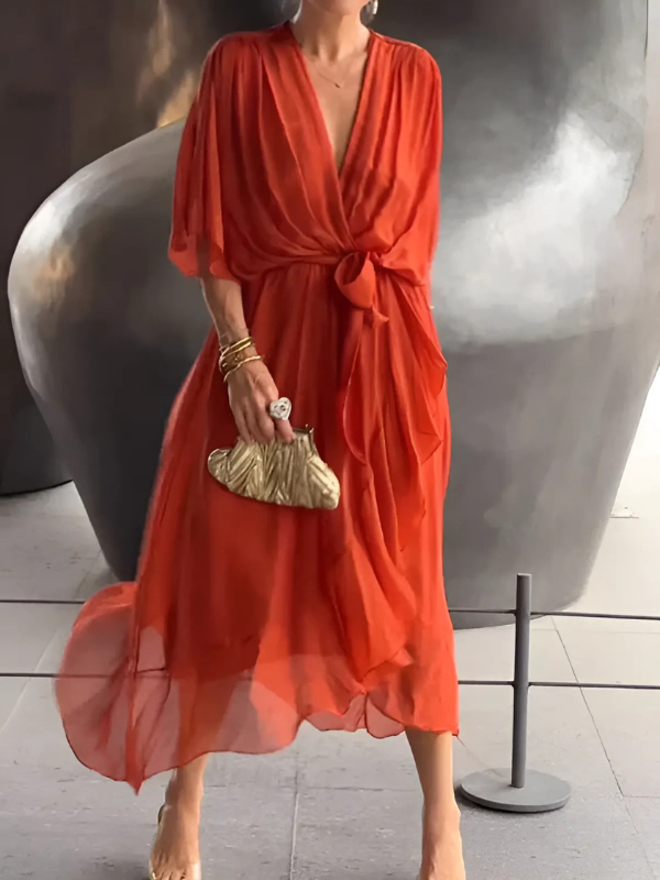 Elegant V-neck maxi dress for women, ideal for summer events. Features a chic tie waist and long, flowing design.