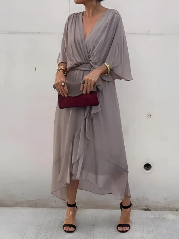 Fashionable women's V-neck maxi dress with an adjustable tie waist, a must-have for elegant summer style and comfort.