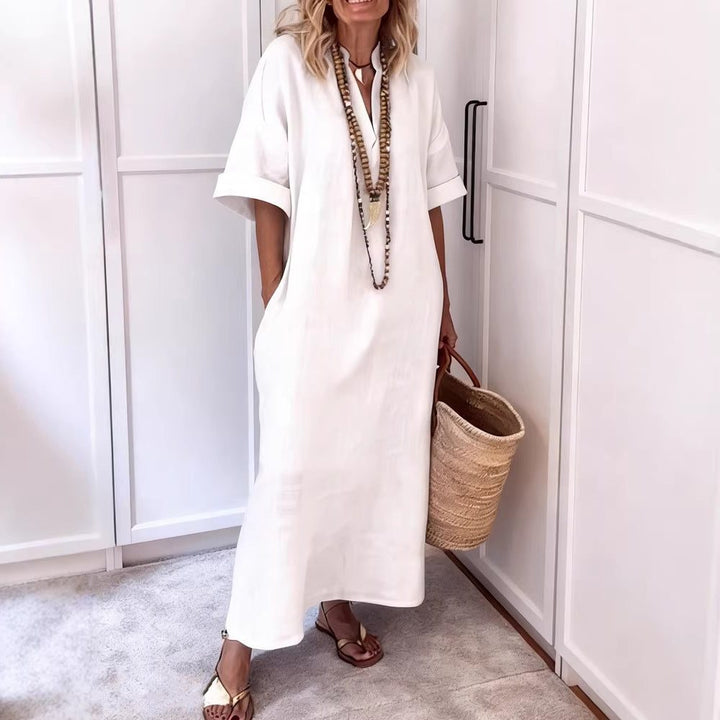 Effortless women's V-neck maxi shift dress with pockets, perfect for summer, vacation, or everyday casual style.
