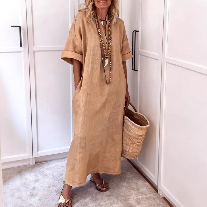Comfortable & versatile women's V-neck maxi shift dress with pockets, great for easy wear and various occasions.