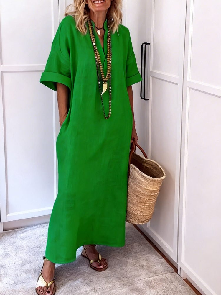 Women's V-neck maxi shift dress with pockets for comfort and style; a versatile casual and summer vacation essential.