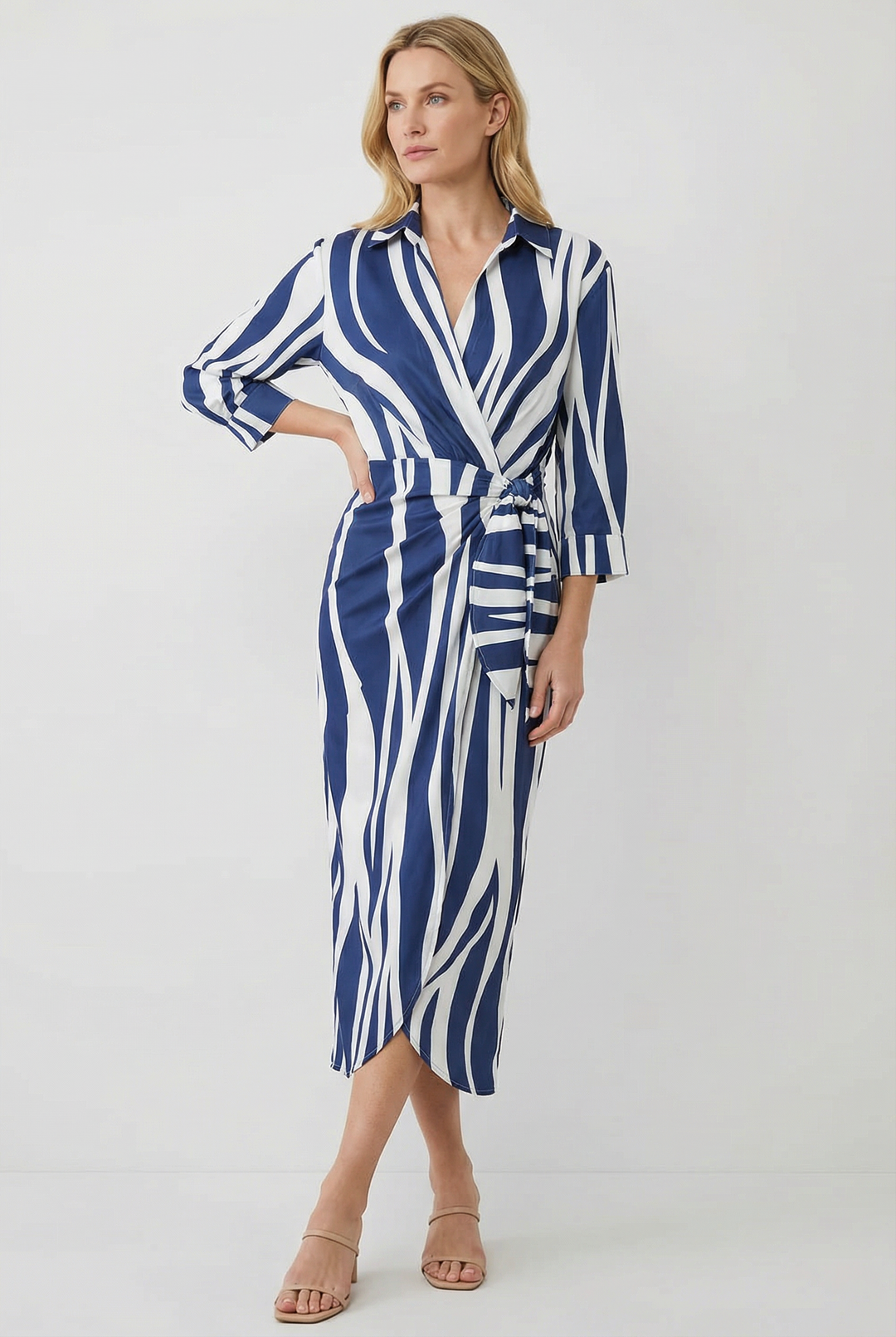 Flowy long sleeve women's dress, a printed midi style with a feminine tie waist