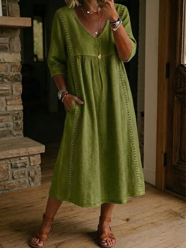 Effortless women's everyday midi dress with a V-neck and pockets. Perfect for all-season comfort & style.