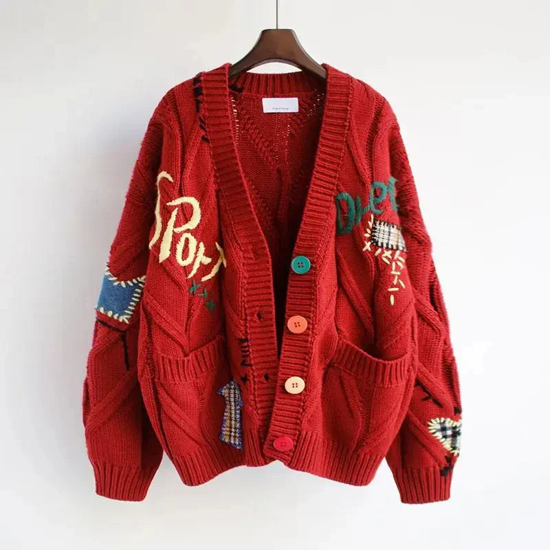 Chic V-neck women's cardigan with detailed patchwork embroidery, ideal for layering in fall or spring.