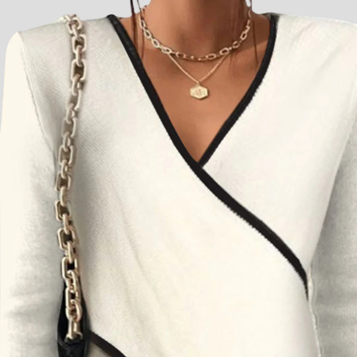 Cozy long sleeve V-neck knit sweater for women, ideal for fall and winter fashion.