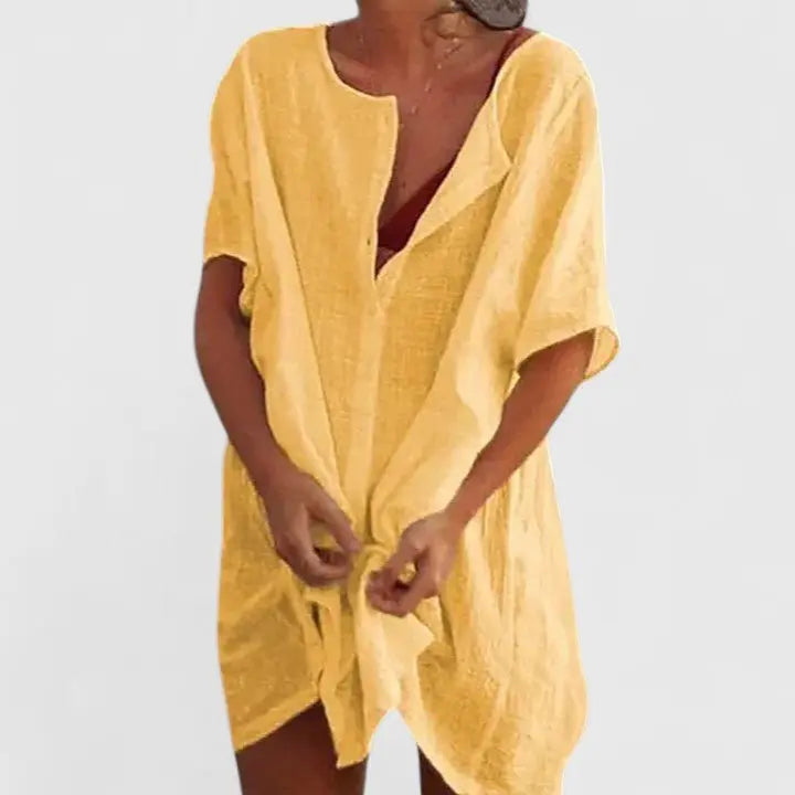 Comfortable women's V-neck tunic dress, relaxed fit, great for summer beachwear.