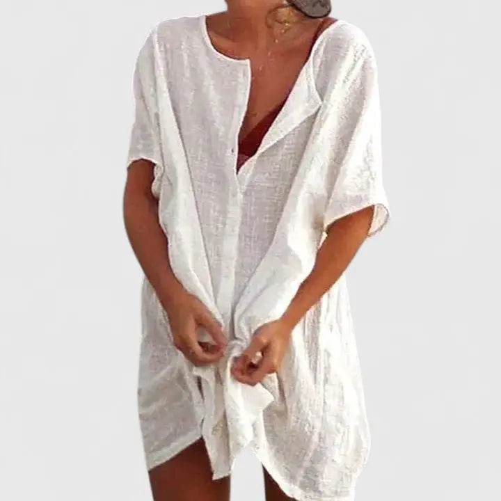 Flowy women's V-neck relaxed fit midi tunic dress, ideal for summer casual outings.