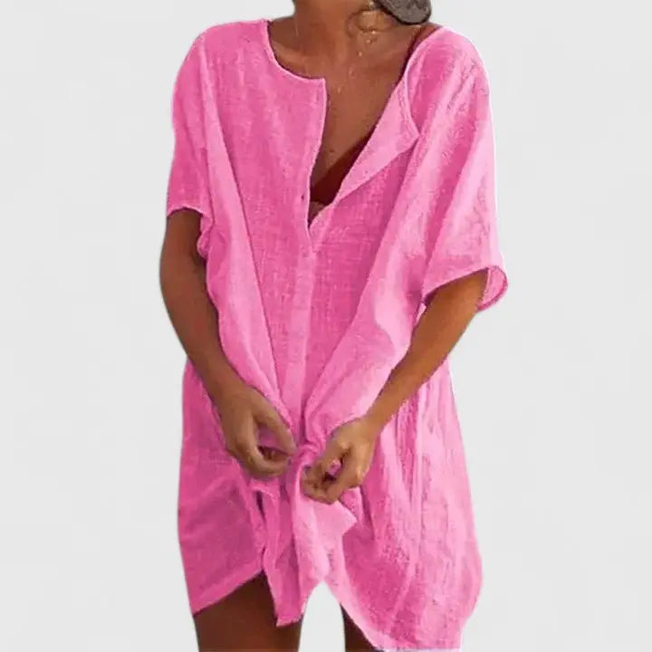 Midi length women's V-neck tunic dress with a comfortable relaxed fit for summer.
