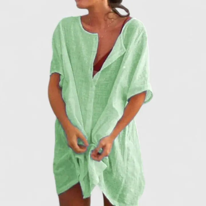 Relaxed fit V-neck tunic dress for women, a comfortable midi summer style.