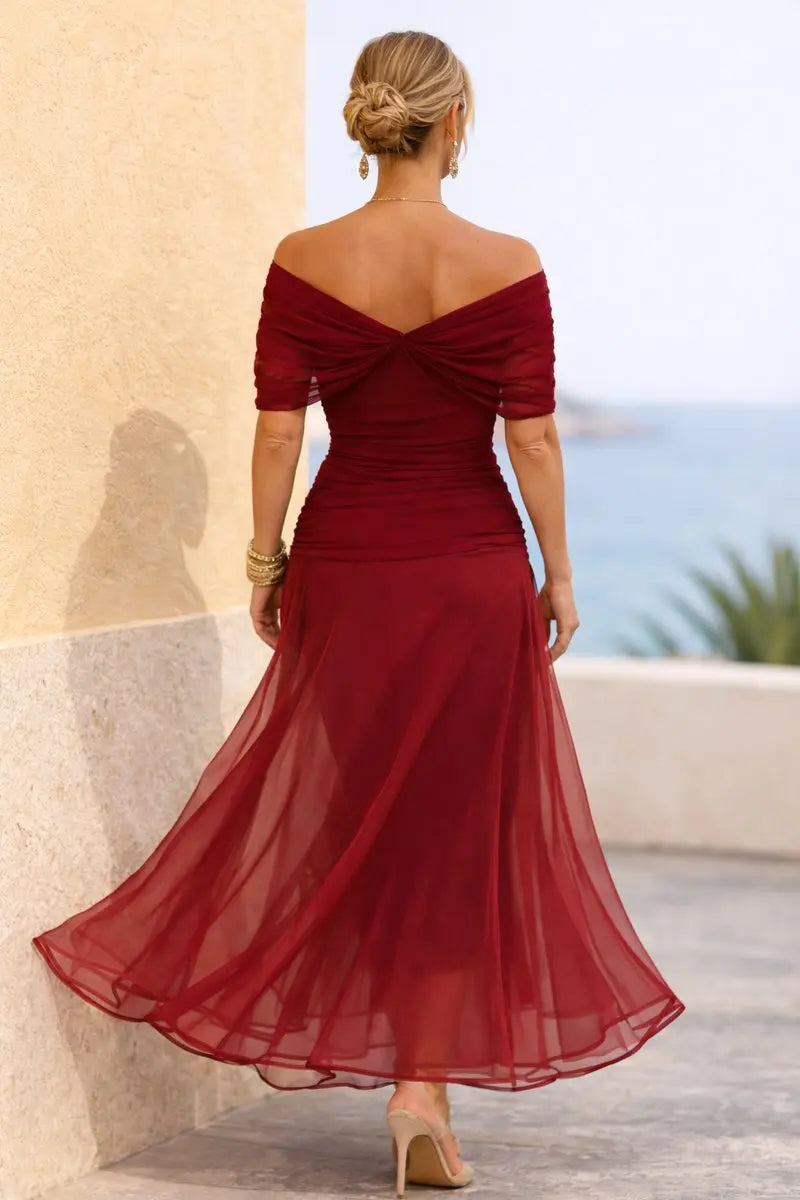 V-neck flutter sleeve maxi dress with ruched waist, a chic plus size formal option.