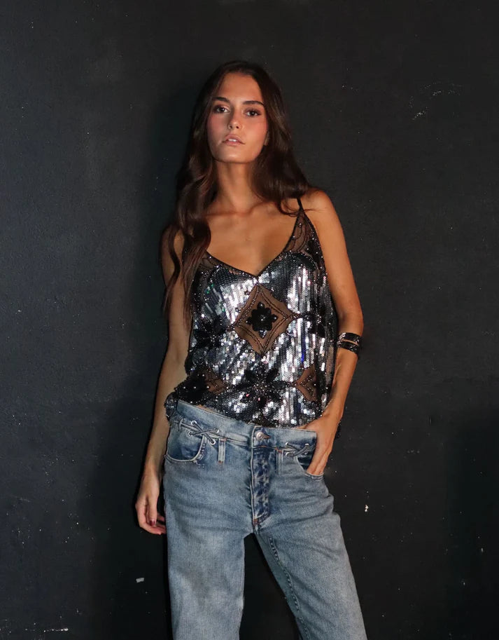 Stylish women's sequin V-neck top, perfect party wear. Embellished glamour blouse for a dazzling evening look.
