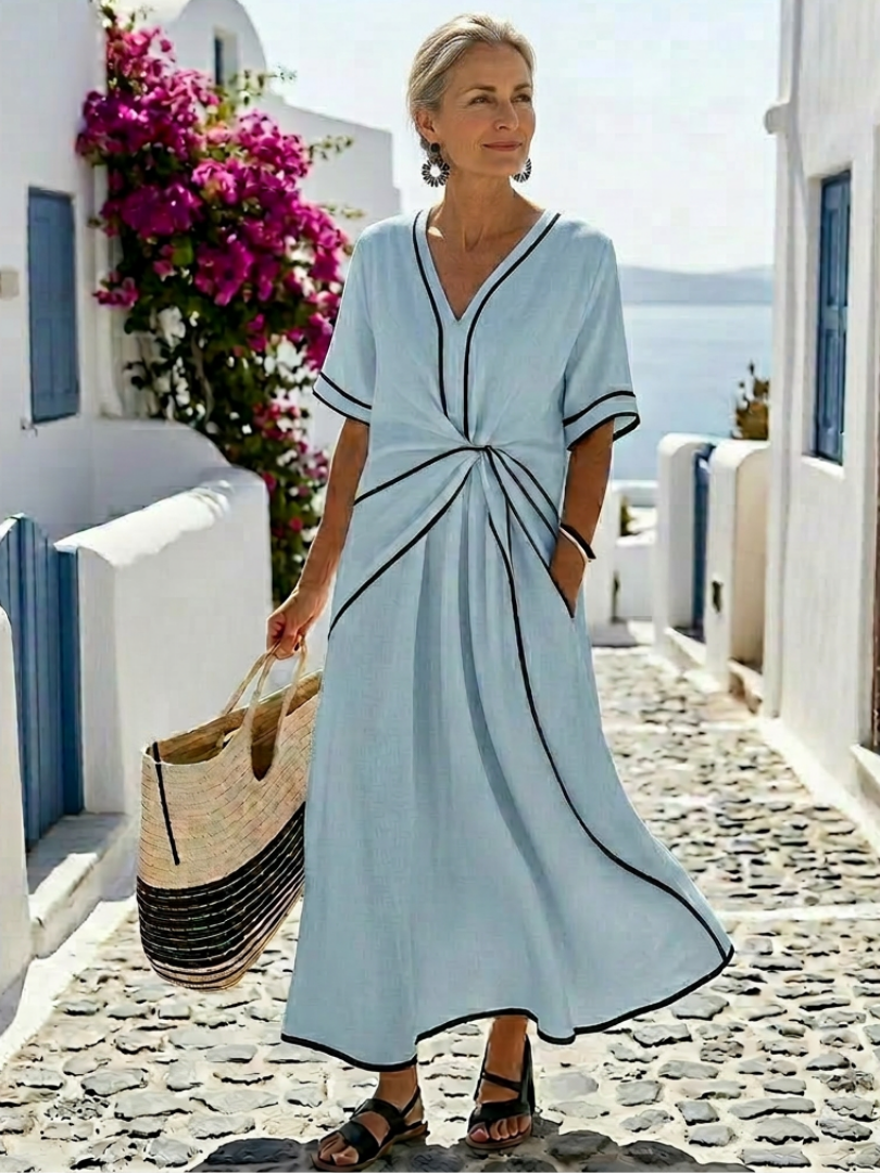 Front view: Women's V-neck short sleeve midi dress with a flattering gathered waist. Casual summer style.