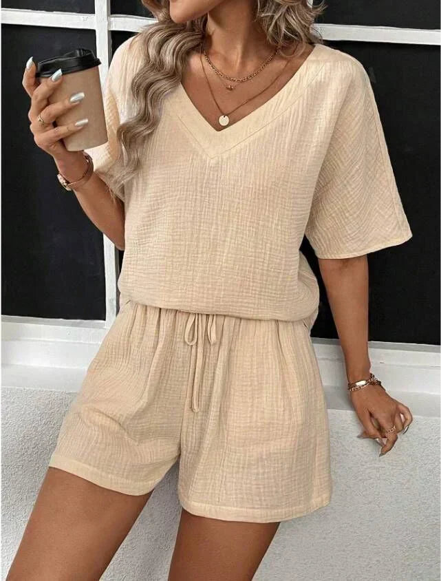 Effortless women's V-neck top and shorts set for comfortable summer style, casual wear, and day-to-night outfits.