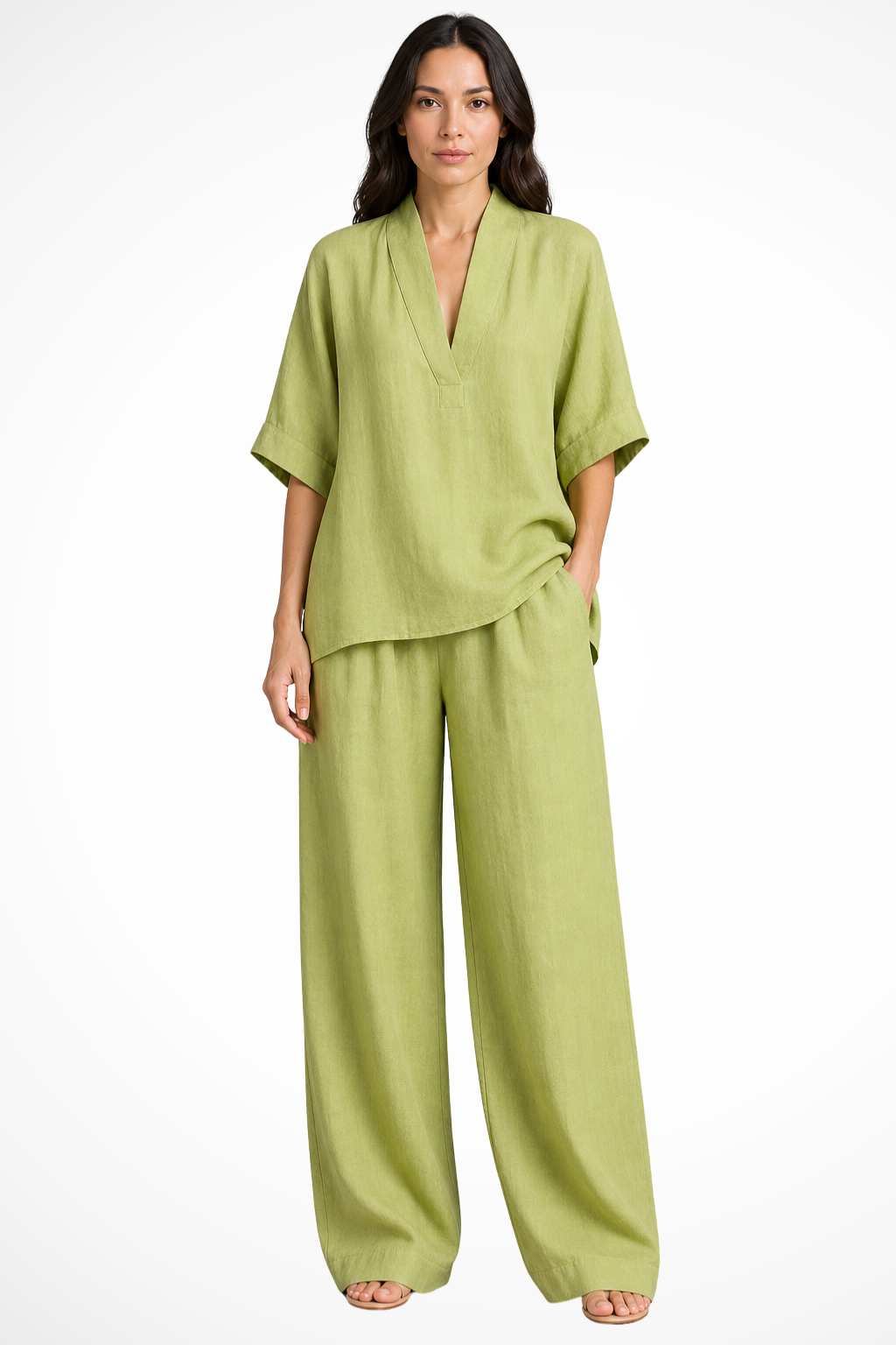 Stylish women's two-piece coord set featuring a v-neck top & wide leg trousers. Perfect summer ensemble.