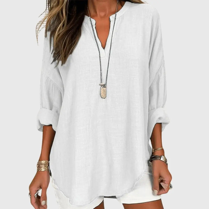 Flowy lightweight V-neck tunic blouse for women, long sleeve and relaxed fit, ideal for summer outfits.
