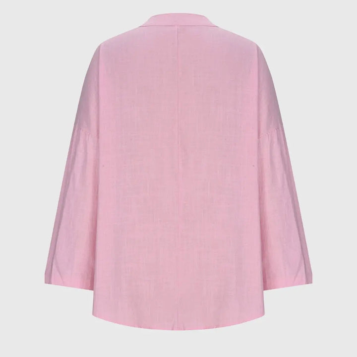 Comfortable women's V-neck tunic blouse, effortless long sleeve and relaxed fit for chic casual wear.