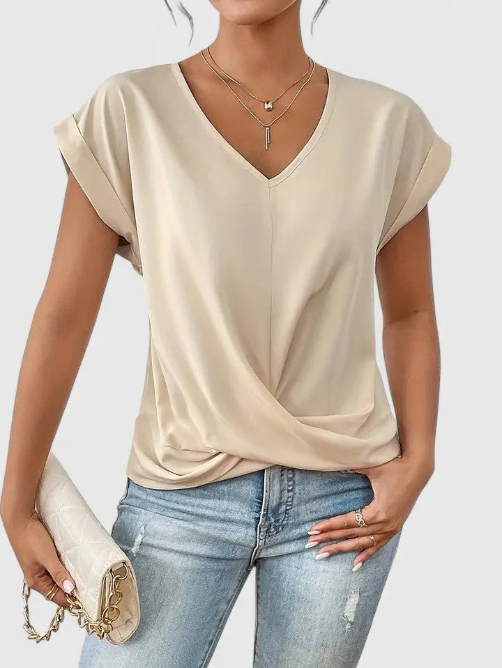 Women's V-neck twist front short sleeve top in a solid color, perfect for casual everyday style and comfort.