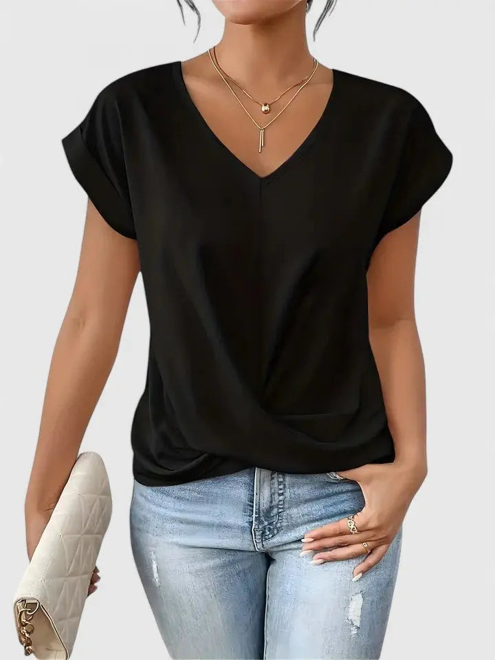 Comfortable short sleeve V-neck top for women, featuring a trendy twist front detail; great for casual wear.