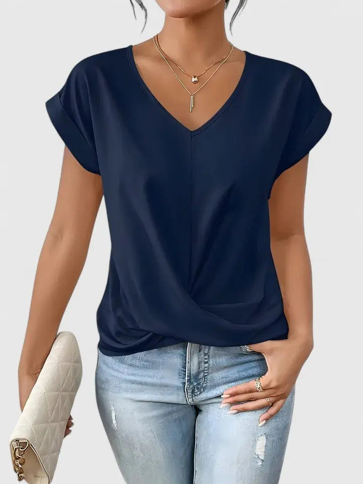 Trendy women's casual V-neck top featuring a stylish twist front and comfortable short sleeves; a chic everyday essential.