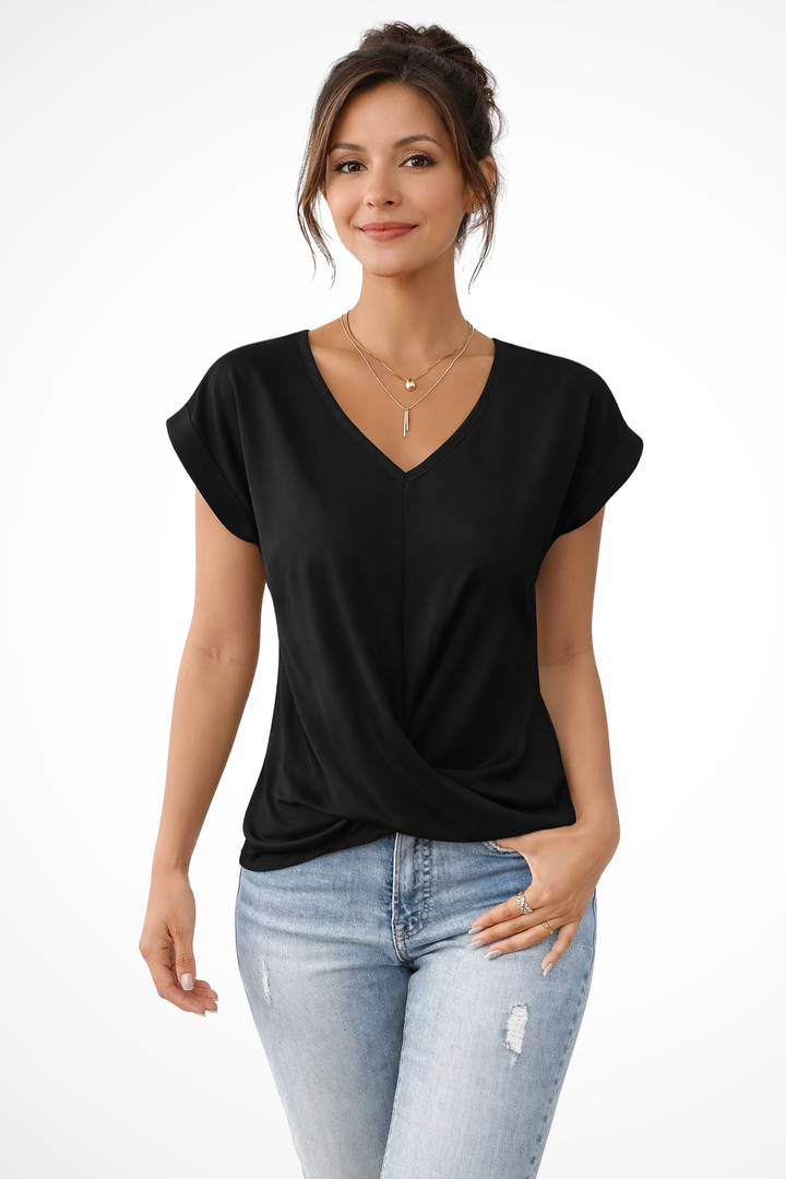 Comfortable women's V-neck top with a unique twist hem, perfect for going out.