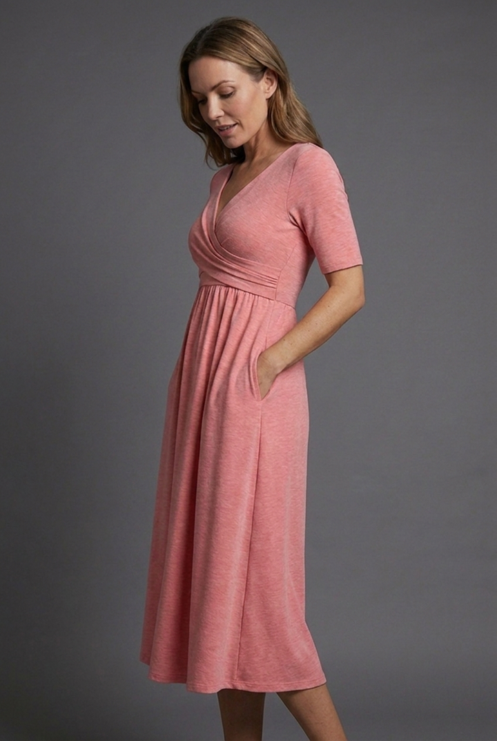 Stylish ladies' V-neck wrap front midi dress featuring convenient pockets, perfect for a chic summer outfit.