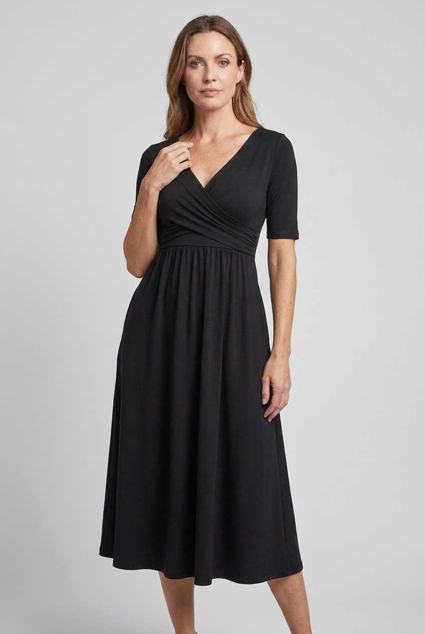 Model wearing a flattering women's V-neck wrap midi summer dress with pockets. Perfect for ladies' fashion.