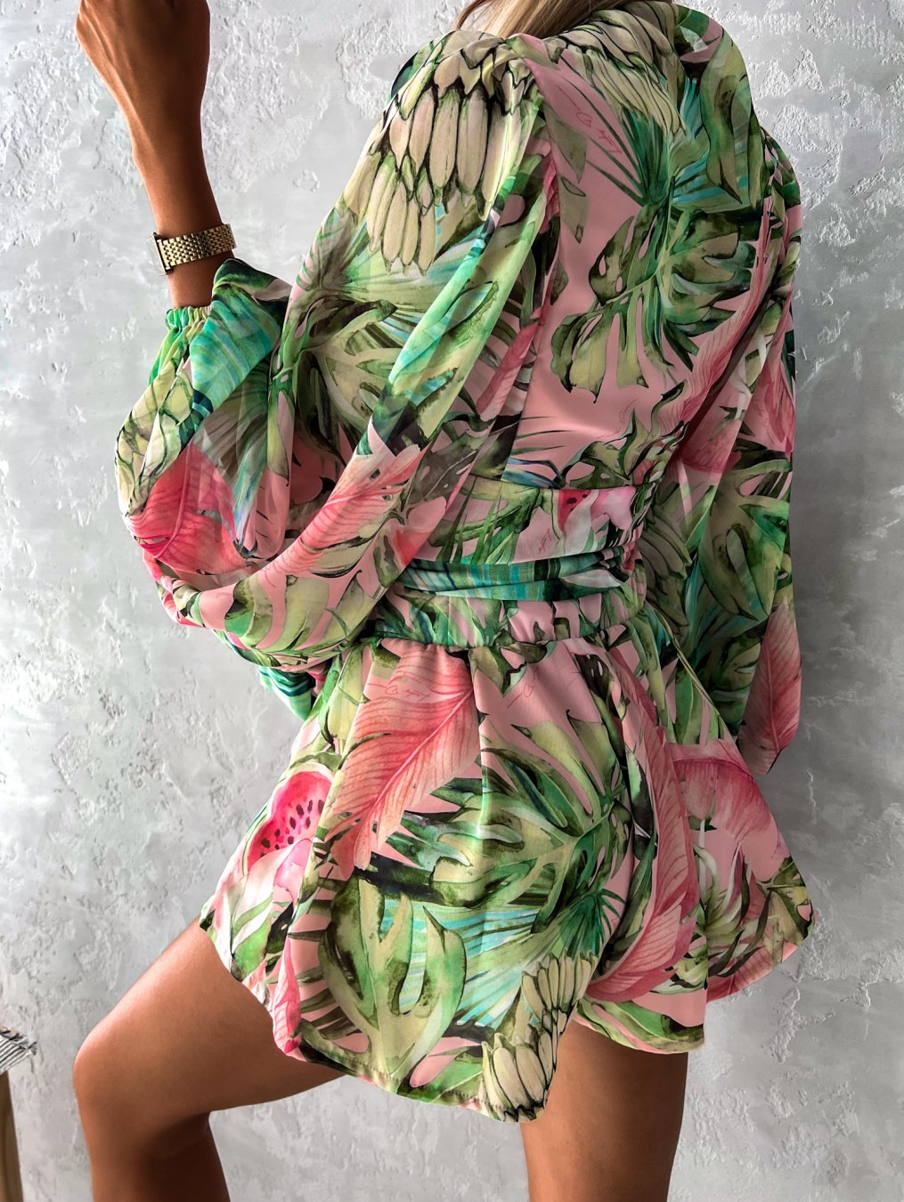 Comfy yet elegant women's V-neck short set, wrap front top, tie-waist shorts for warm weather casual wear.