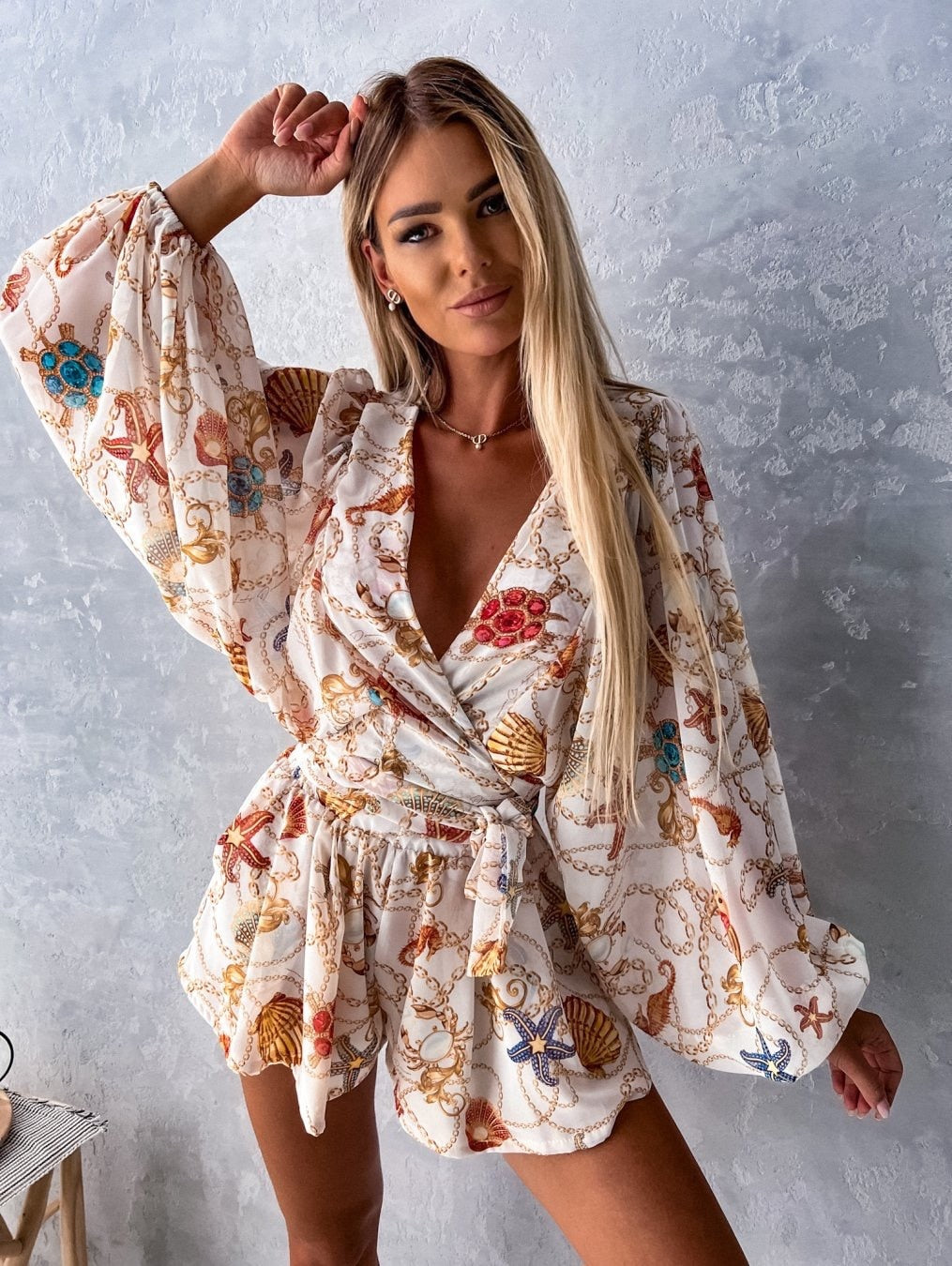 Coordinated women's short set: V-neck wrap top and shorts with a flattering tie waist, great for summer.