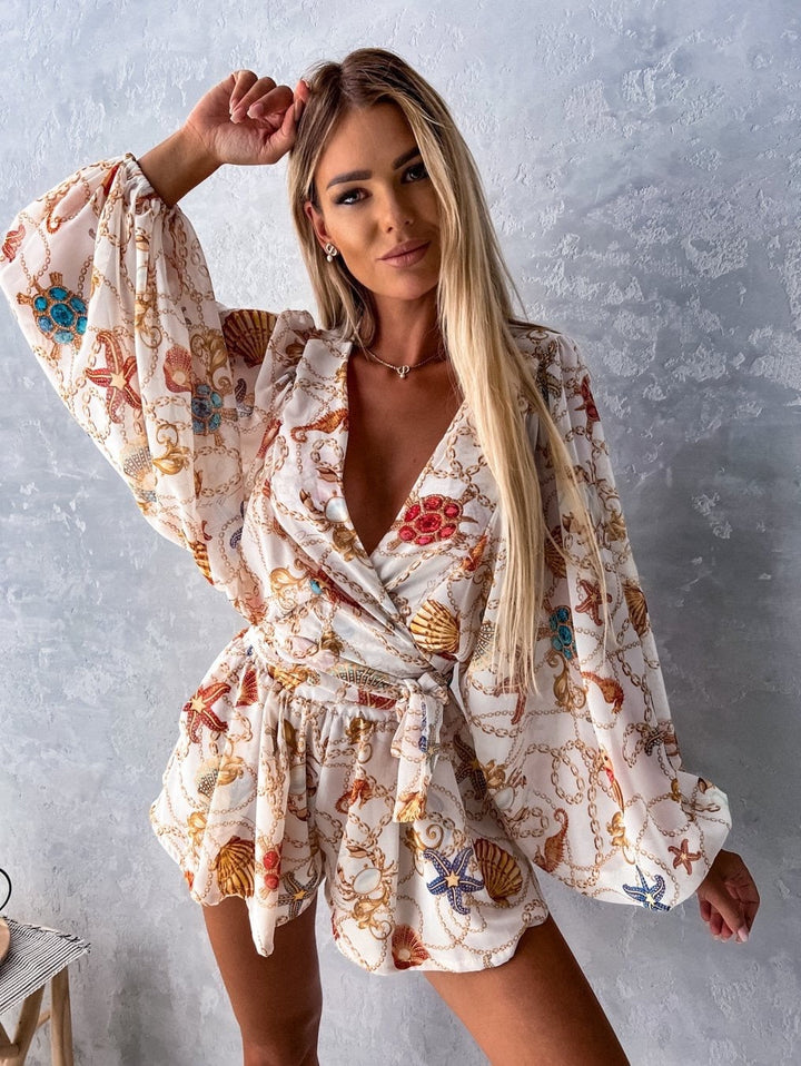 Coordinated women's short set: V-neck wrap top and shorts with a flattering tie waist, great for summer.