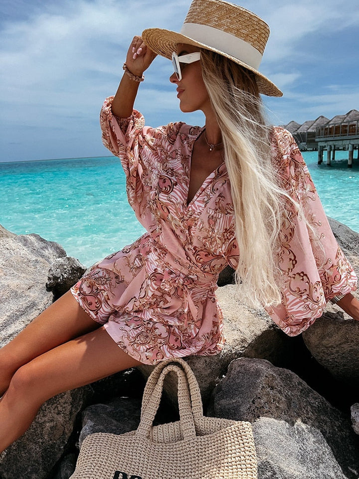 Effortlessly elegant women's short set with V-neck, wrap front, and stylish tie waist. Casual summer fashion.