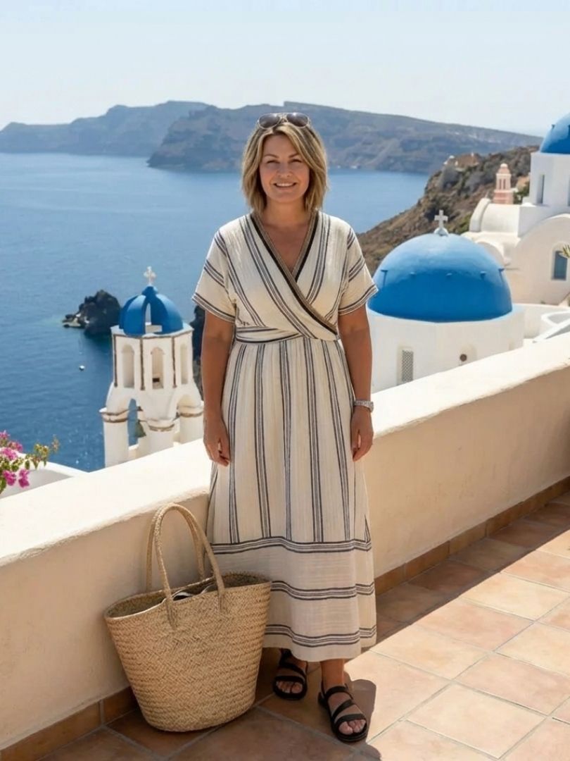 Versatile women's V-neck midi wrap dress with short sleeves. Ideal day dress for elegant, casual summer wear.